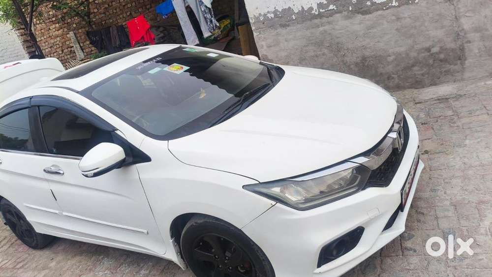 Petrol Cng. Sunroof Push Start Back Camera Stereo