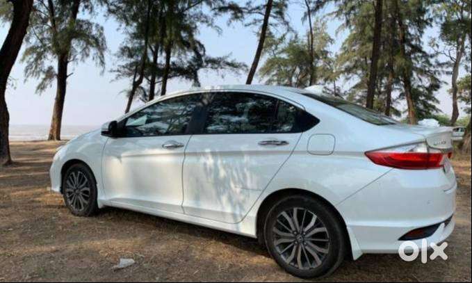 White Honda City Regd. On 11.01.2019