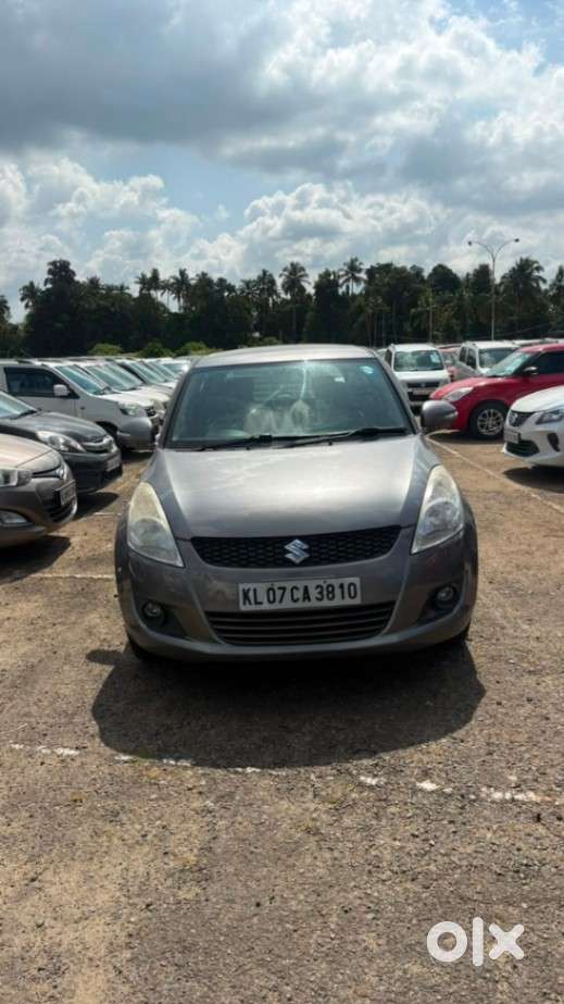 Maruti Suzuki Swift 1.2 Vxi (o), 2014, Petrol