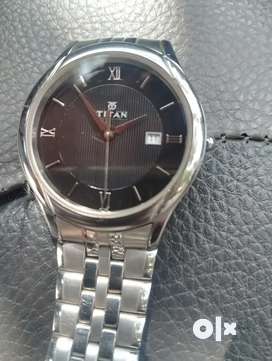 Titan watch hot sale 1494scb price