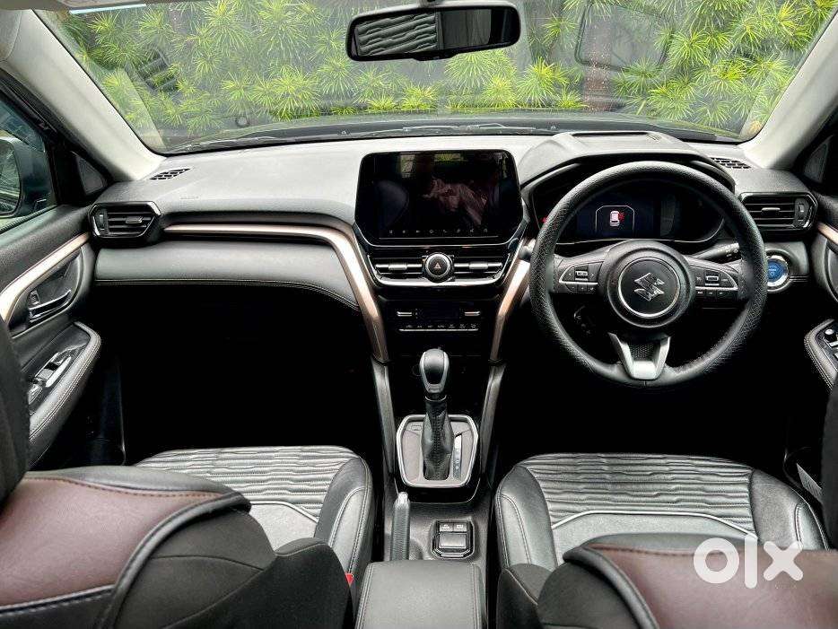 Maruti Suzuki Grand Vitara 1.5 Zeta Plus Dual Tone Intelligent Hybri..