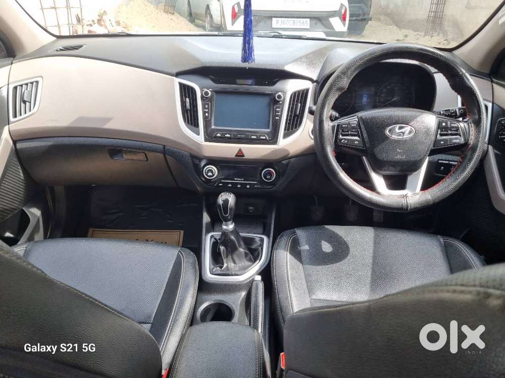 Creta Top Model With Sunroof , Electric Seat , Rear Seat Hand Rest