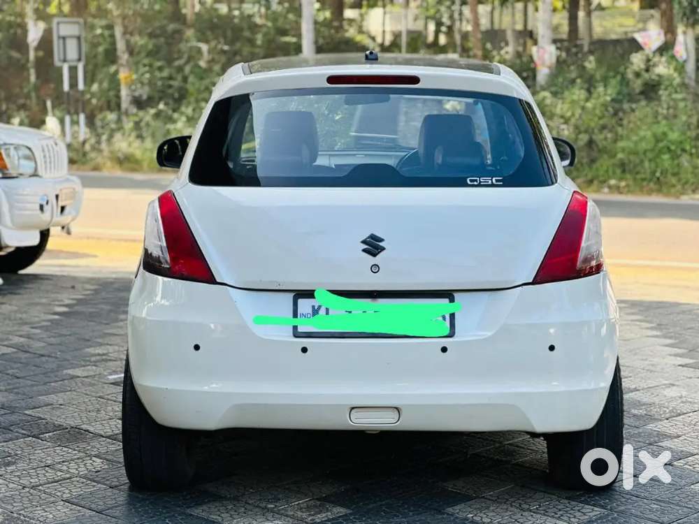 Maruti Suzuki Swift Lxi 2015