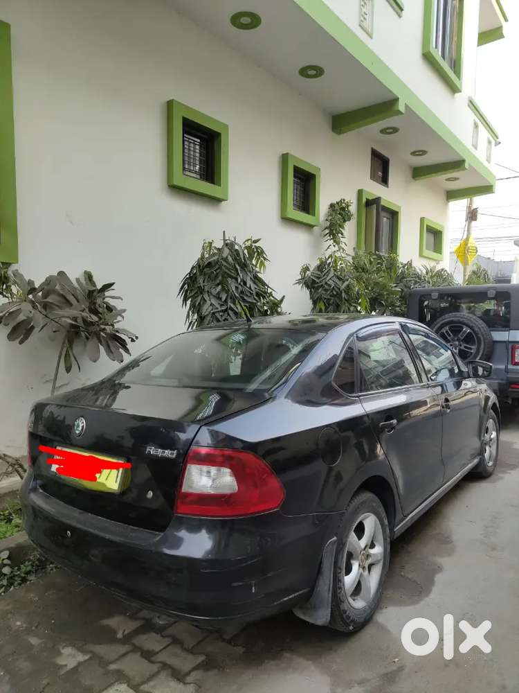 Skoda Rapid Elegance 2013 Car