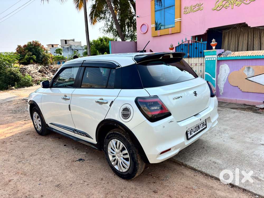 Maruti Suzuki Swift Vxi (o) 2024