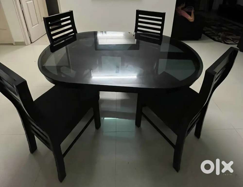 Glass top wooden dining table with 4 chairs