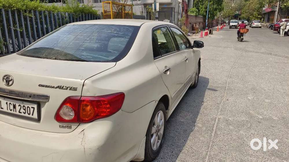 Corolla Altis 2010 , Less Driven Petrol+ Cng