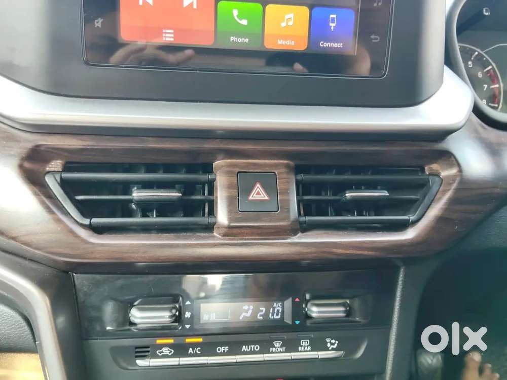Maruti Brezza Vxi 2024