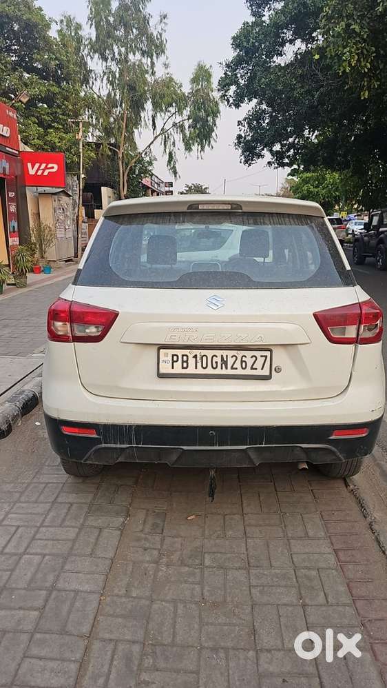 Brezza First Owner White Colour Geuine Family Car