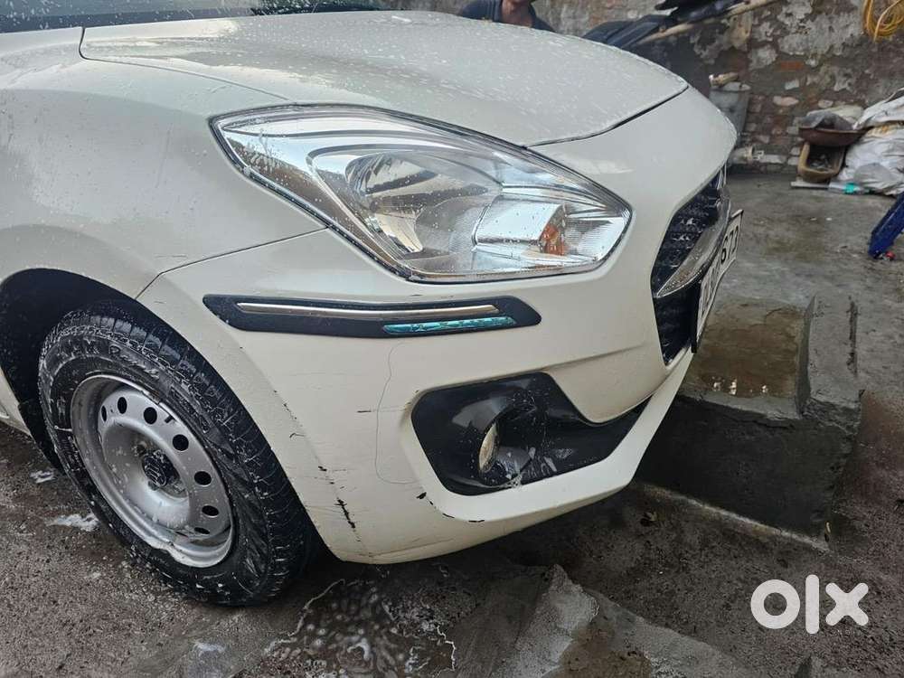Swift , 2022, Petrol , White Color , 23200km Driven ,