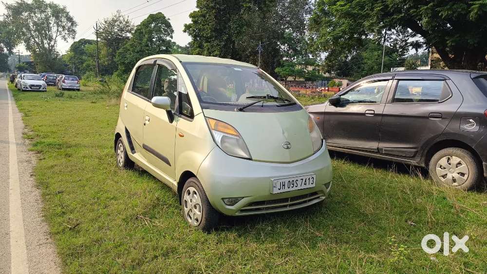 Tata Nano Lx 2012 Magenta Green Colour