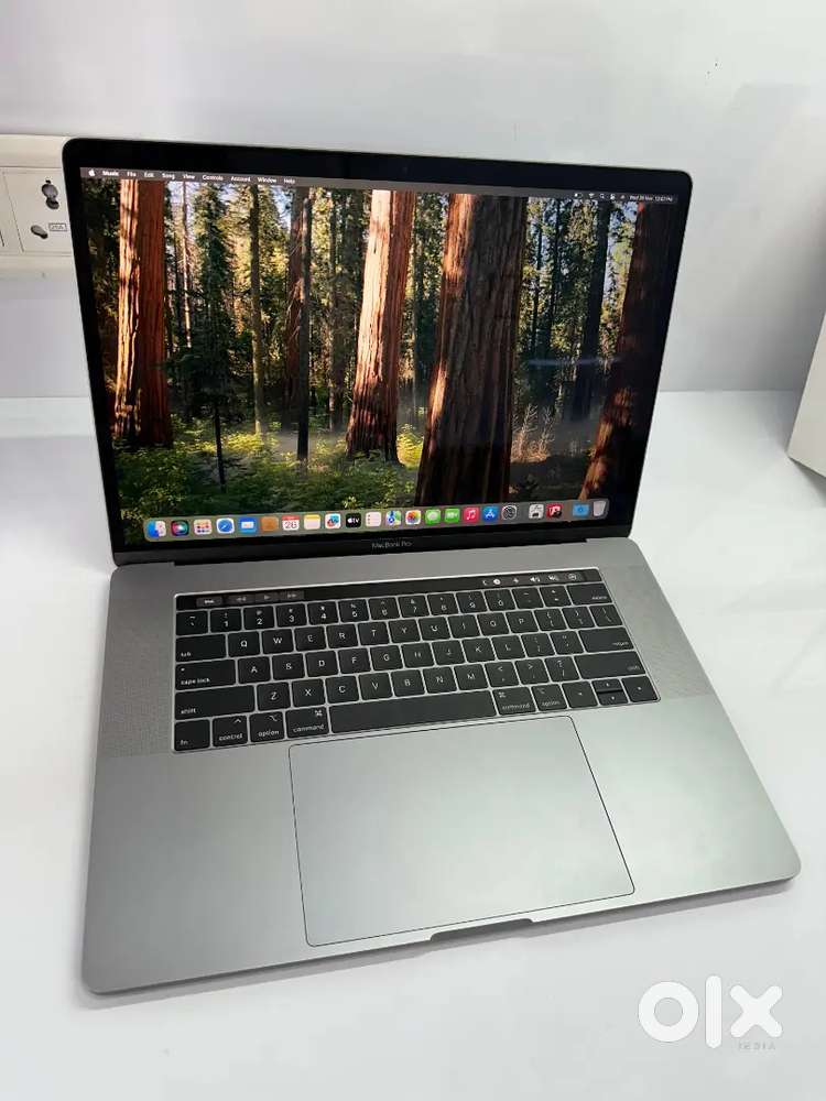 15 Macbook Pro Touchbar 16Gb Ram 256Gb SSD 5.5Gb Total Gfx