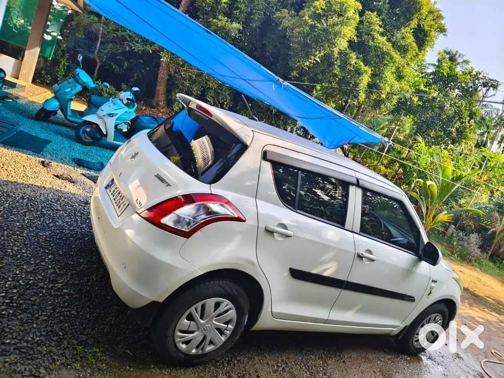 Maruti Suzuki Swift Lxi 2015