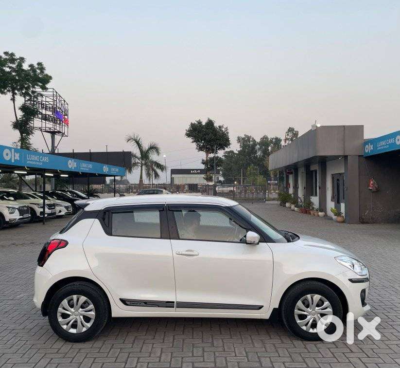 Maruti Suzuki Swift 1.2 Vxi (o), 2023, Petrol