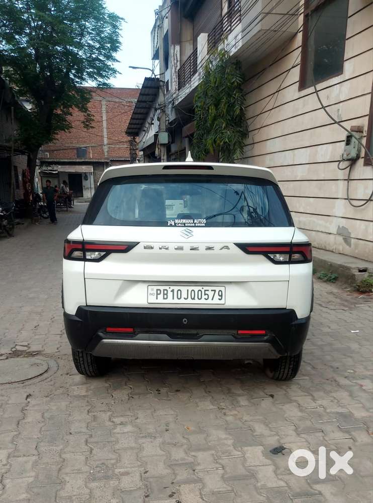 Maruti Suzuki Brezza 1.5 Lxi Smart Hybrid, 2024, Petrol