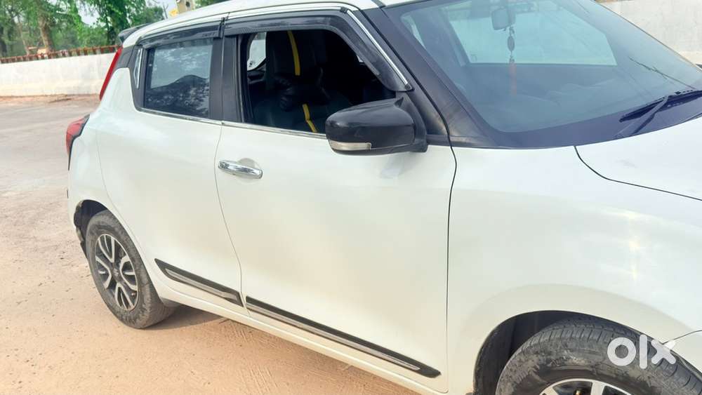 Swift Vxi 2021 Km Driven