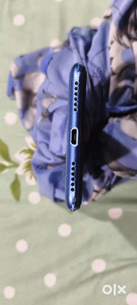 MI brand mobile 8 year old phone 4G works fine usable for calls.