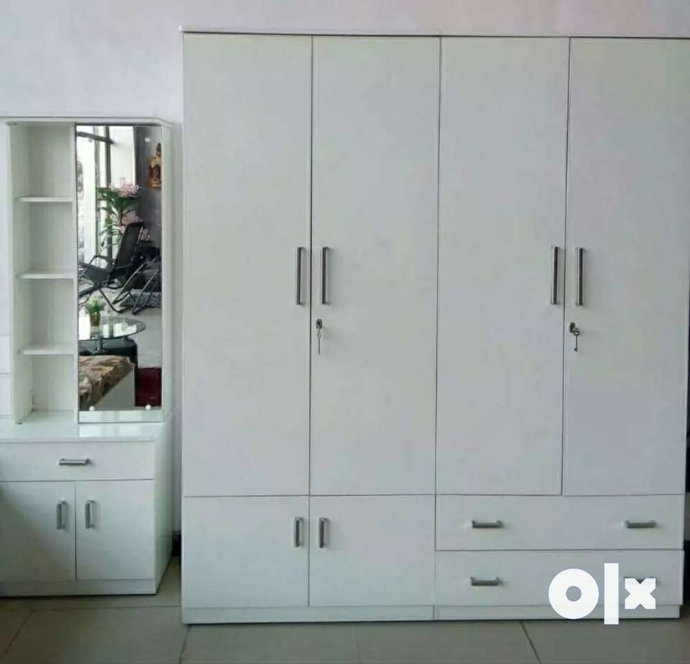 White wardrobe deals with dressing table