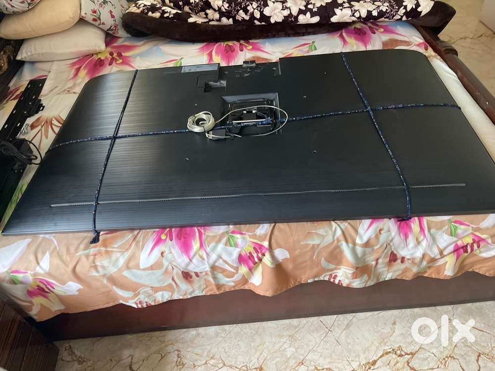 65 inches QLED TV set .