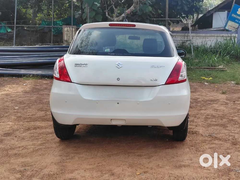 Maruti Suzuki Swift 2016 Lxi Optionel