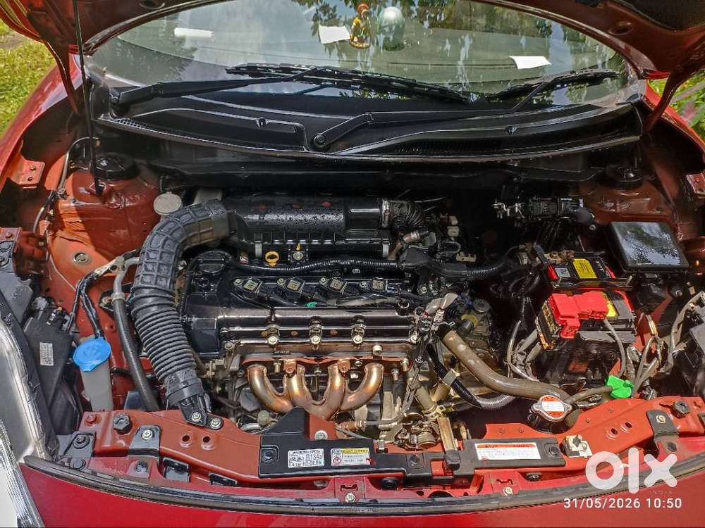 Maruti Suzuki Dzire ( Gallant Red). First Owner