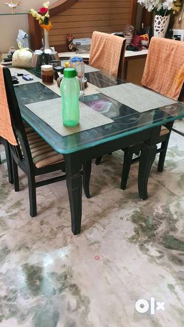 Olx dining 2025 table 4 seater