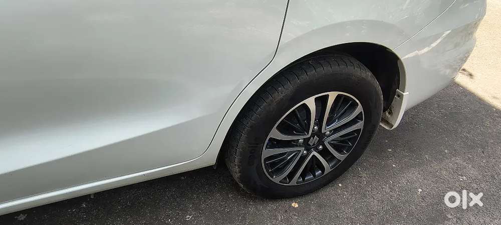 Ertiga Zxi (0) Cng Top Model