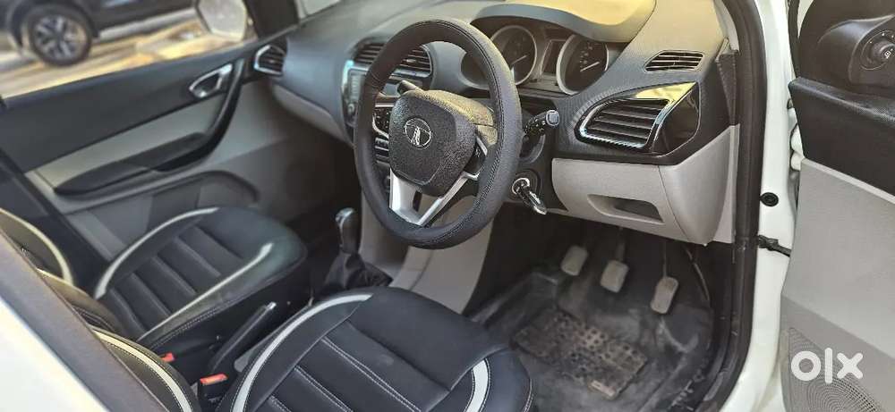 Make _ Tata 
Variant _  Tiago Xz Petrol 
Model _ 2018(2),