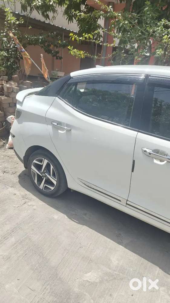 Hyundai Aura 2022 Petrol 41000 Km  Services Centre ,armrest,sunshades