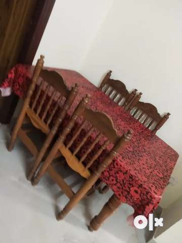 Olx dining best sale table 4 seater