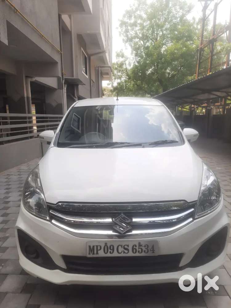 White Ertiga, Brand New Spare Tire, Only 1 Year Old Battery.