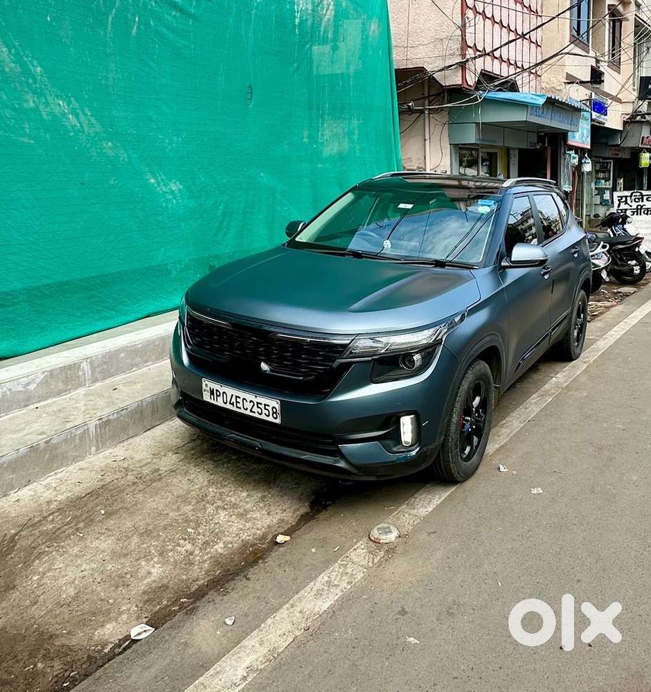 Kia Seltos Petrol Well Maintained Modified With Wrap Og Clour White.