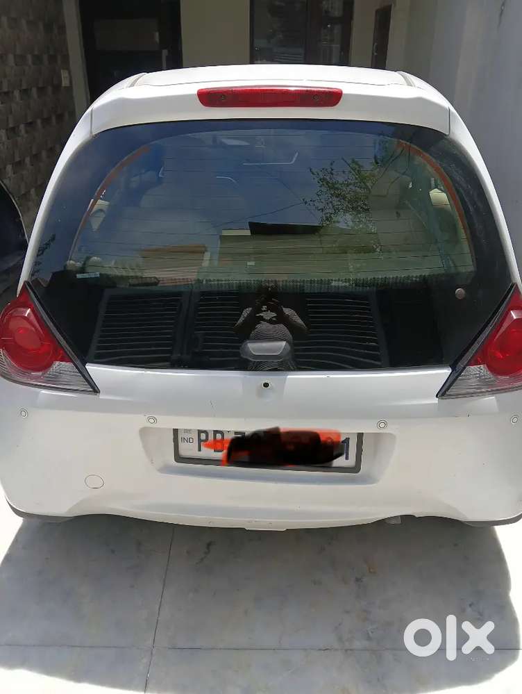 White Petrol Car For Sale – Low Running, Excellent Condition