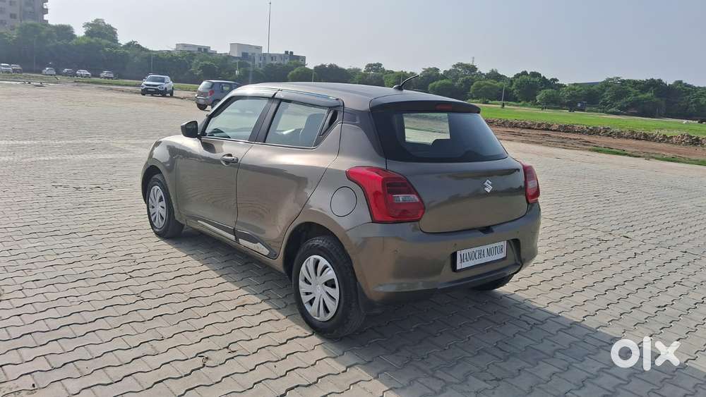 Maruti Suzuki Swift 1.2 Lxi (o), 2023, Petrol