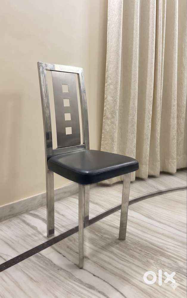Stainless Steel Dining Chair with Black Cushioned Seat (4 available)