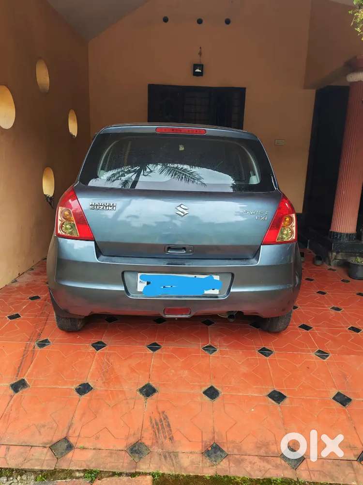 Maruti Suzuki Swift Lxi 2011