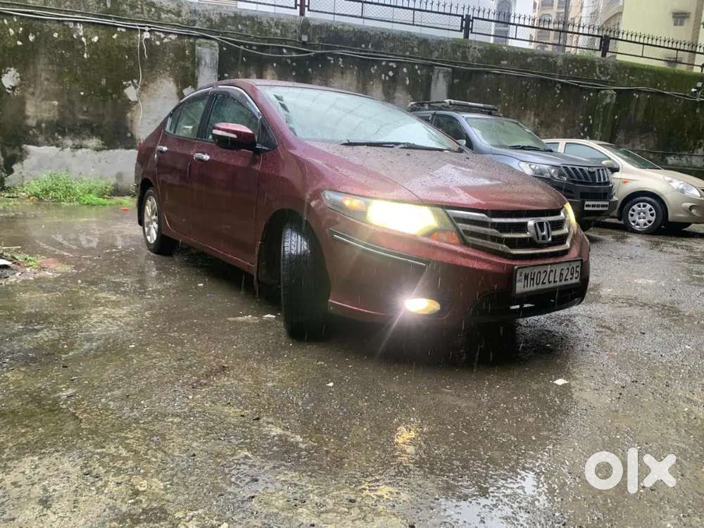 Maroon Honda City I-v Tech 1.5 V 2012