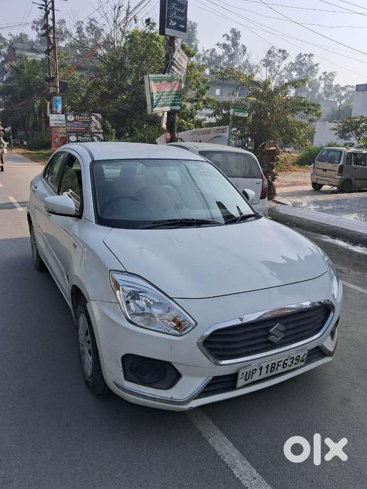 Maruti Swift Dzire 2017 Lxi Manual  White  40,000 Km  Single Owner