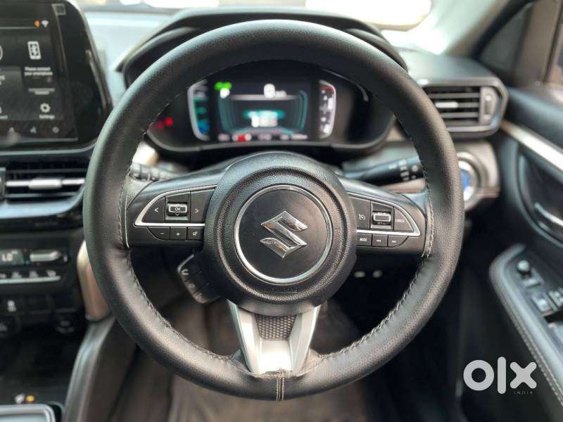 Maruti Suzuki Grand Vitara 1.5 Zeta Plus Dual Tone Intelligent Hybri..