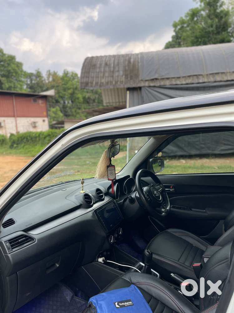 Maruti Suzuki Swift 1.2 Vxi (o), 2023, Petrol