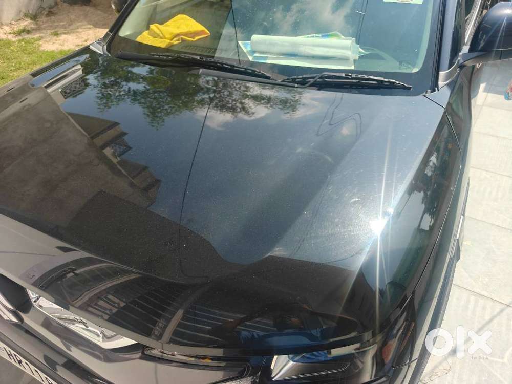 Maruti Suzuki Brezza Vxi 2025