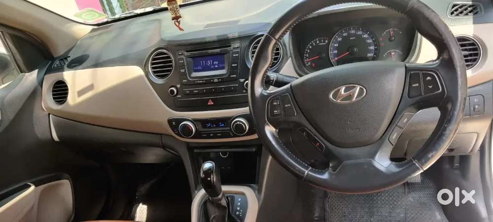 White Hyundai Xcent 2015 Petrol. Automatic Transmission.good Condition