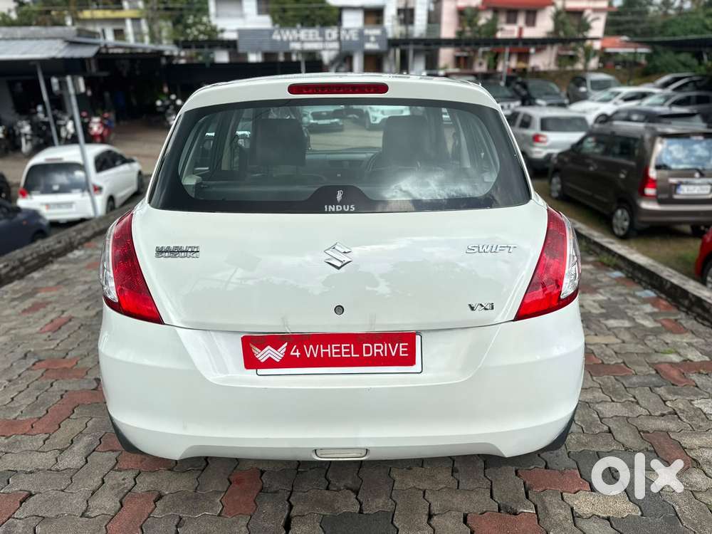 Maruti Suzuki Swift Lxi Optional-o, 2013