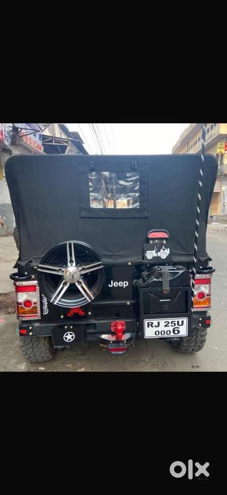 Modified Jeep .. Look Like Open Thar With Big Alloy Wheel