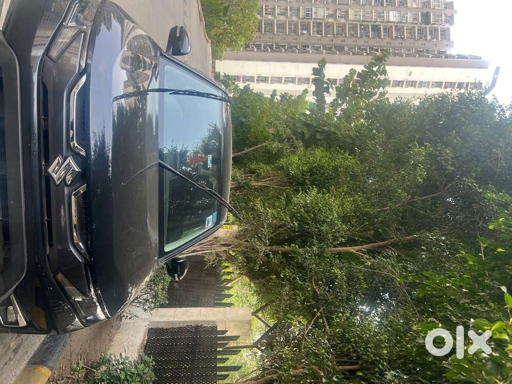 Breeza, October 2025,vxi Hybrid Automatic, Driven 6 Months