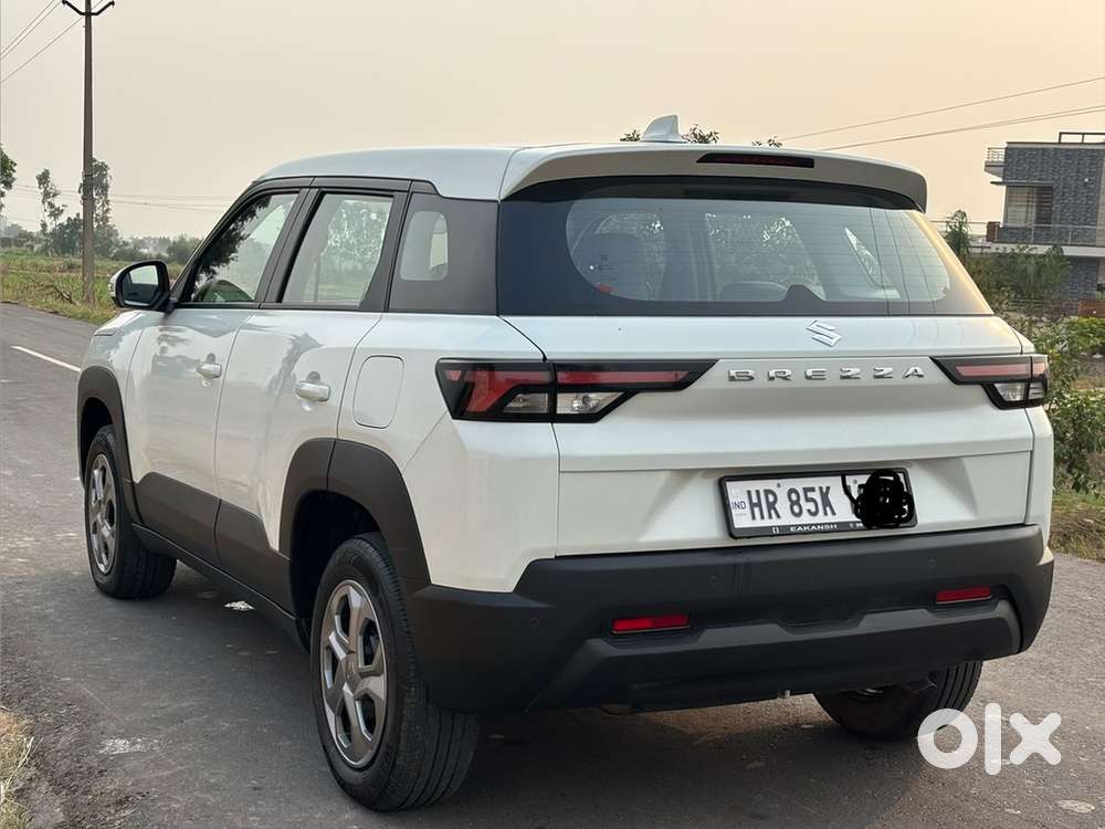 Maruti Suzuki Brezza Vxi December 2025