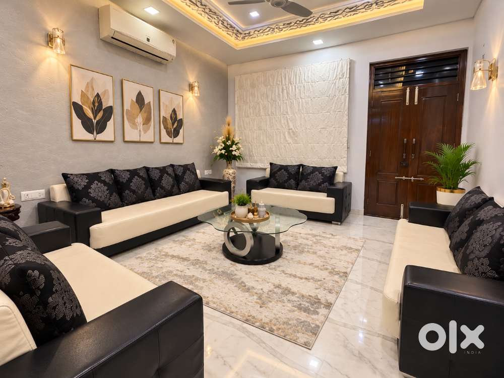 Premium 10-seater black & white sofa set available for sale