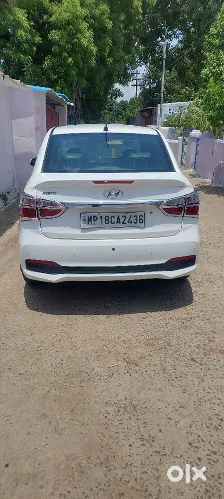 Hyundai Xcent Cng + Petrol  40,000 Km  32 Km/kg Mileage  Excellent