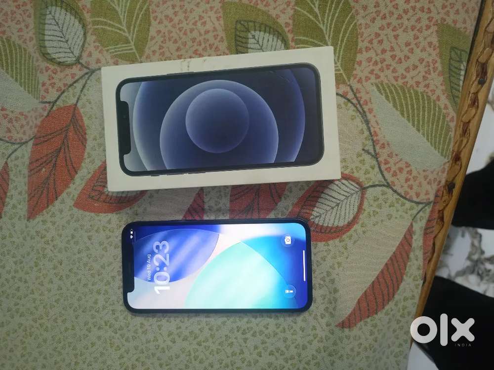 I phone 12 mini in mint condition with box
