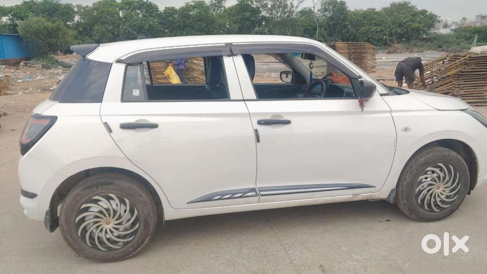 Maruti Suzuki Swift 1.2 Lxi (o), 2024, Petrol